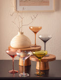 Mid Century Martini Coupes on a table with a vase