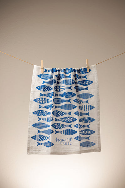Fish Waterfront Tea Towel hanging on a line