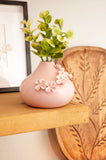 Pink Amelia flower vase on a shelf