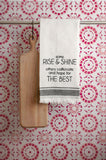 Rise & Shine Waffle Weave Tea Towels hanging with a cutting board
