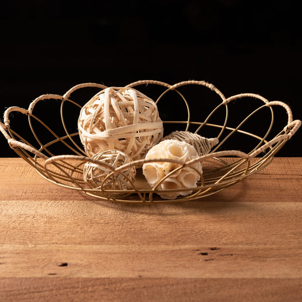 Wire & Cane Flower Basket on a table
