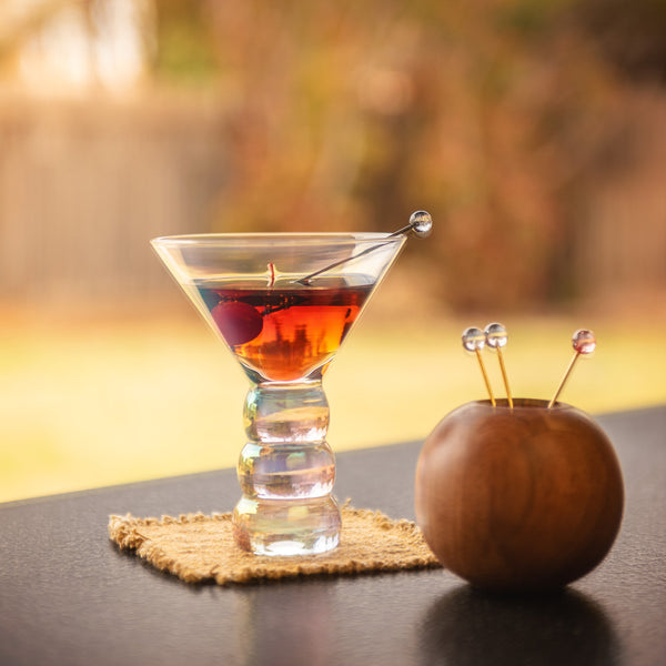 Lexi olive picks in a Lexi martini glass