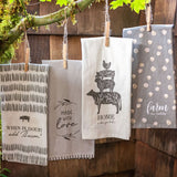 Modern Farmhouse Tea Towels hanging from a tree