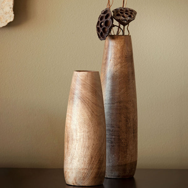 Small natural wood vase on a table