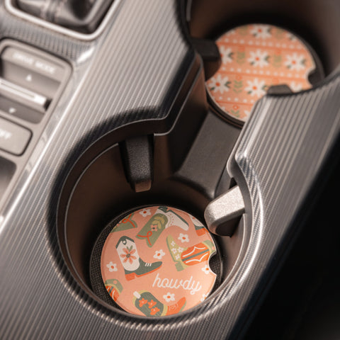 Boots car coaster in cup holder.