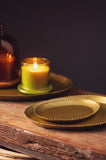 Beaded gold tray with candles