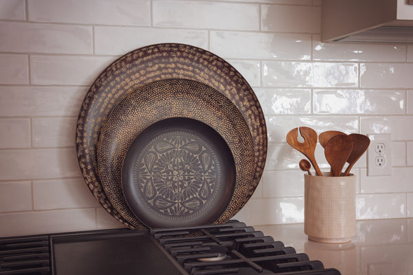 Espresso Round Trays on a counter