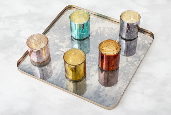 Tray with 3" mercury glass votives on it