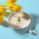 Bee Reese Trinket Trays with a blue background