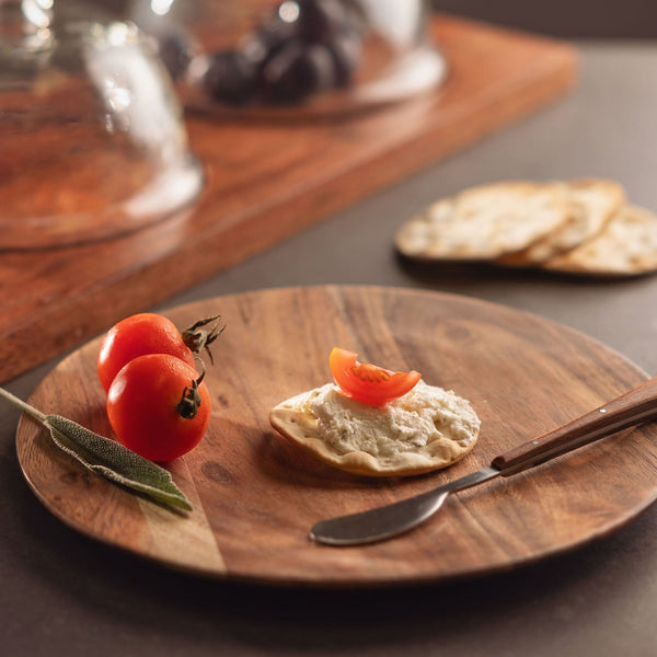 Natural 8" wood plate with food on it