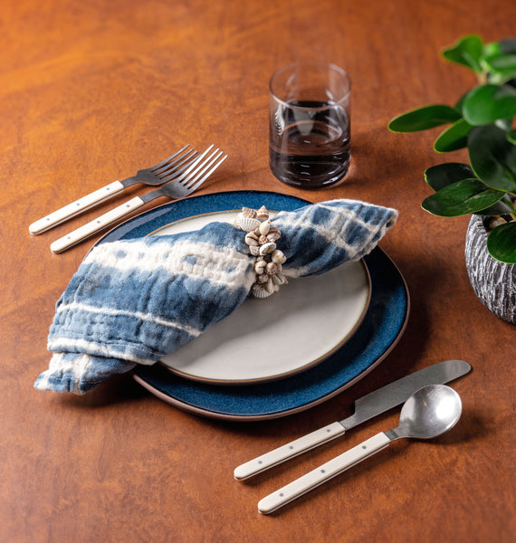 Ivory Resin Flatware in a dinner set up