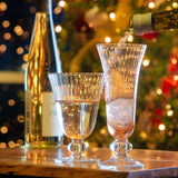 Aria champagne flute on a table