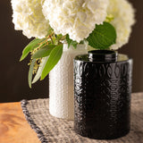 Mid century vase on a table with flowers
