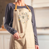 Woman wearing bee apron
