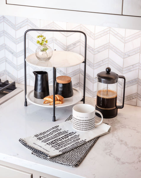 Black mason creamer on a tray