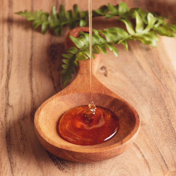 Short Wood Serving Spoons on a table