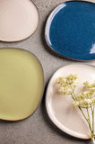 Studio Dinner Plates with a flower